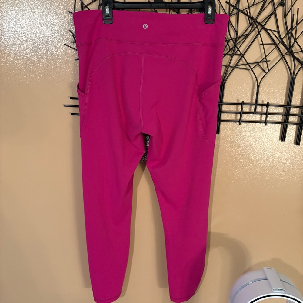 Lululemon Invigorate HR leggings 25"
Ripened Raspberry- VGUC size 14